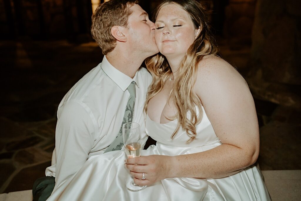 A bride and groom take a moment alone together during their wedding reception at Mt Woodson Castle.