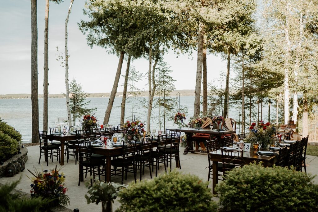 reception space in backyard of lakehouse in the evening